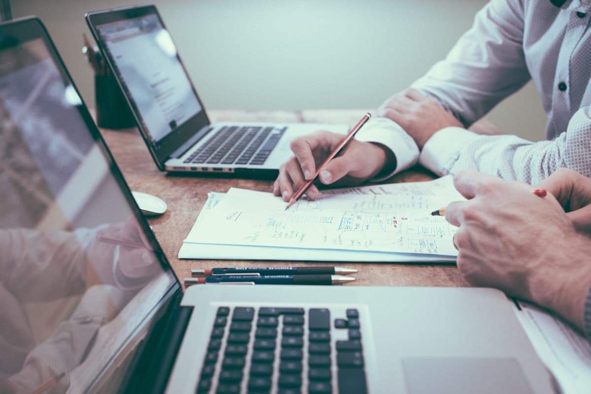 Finance professional reviewing applicant documents for verification